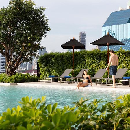 Ascott Embassy Sathorn Bangkok Hotel Bagian luar foto The swimming pool at the hotel
